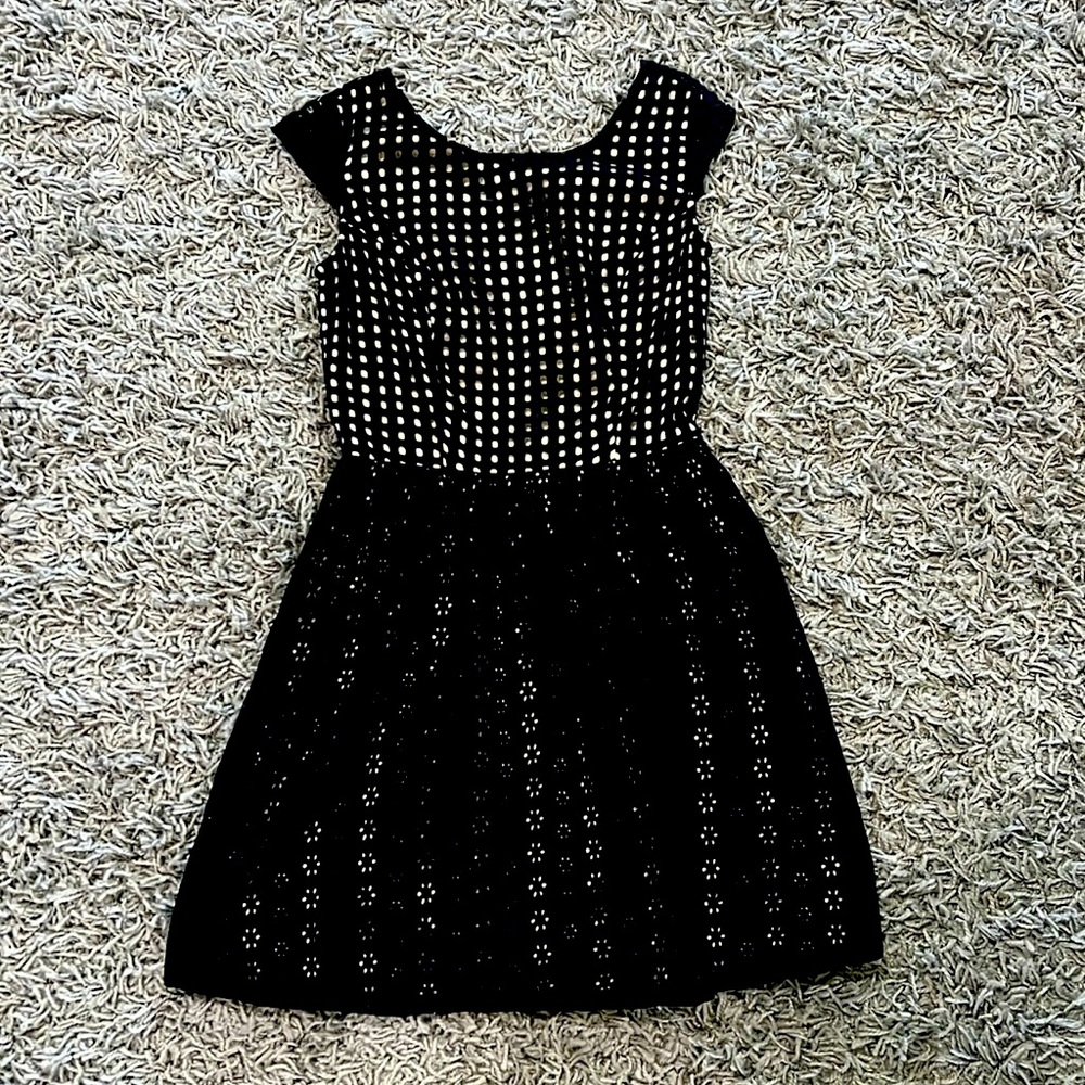 Black dress with nude colored lining. Size xs